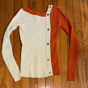 Asymmetrical Off-the-Shoulder Ribbed Sweater in Cream & Orange